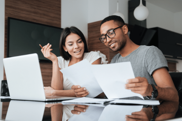Couple-planning-papers-computer (1)